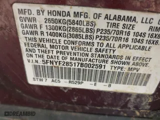 2007 Honda Pilot EX-L with VIN 5FNYF28517B002591, listed as a IAAI auction lot 41760295 with 204,533 mi miles. Bid and sale history available at carsss.com. Image 9.
