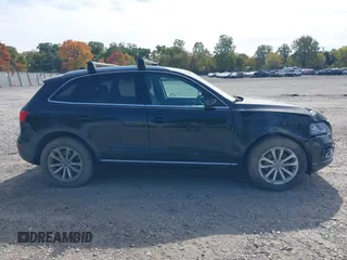 2014 Audi Q5 with VIN WA1CFBFP6EA044866, listed as a IAAI auction lot 40602539 with 99,143 mi miles and . Bid and sale history available at DreamBid. Image 13.