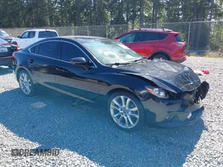 2014 Mazda 6 i Touring with VIN JM1GJ1V69E1128804, listed as a IAAI auction lot 42730732 with 85,458 mi miles and . Bid and sale history available at DreamBid. Image 1.