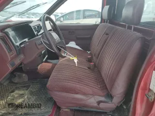 1993 Nissan Frontier z VIN 1N6SD11S0PC332903, wystawiony jako Copart lot #84039484 z przebiegiem 136 324 mil mil oraz Szkoda całkowita • Salvage title. Historia ofert i sprzedaży dostępna na DreamBid. Obrazek 7.
