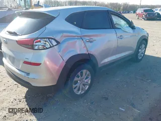 2019 Hyundai Tucson SE with VIN KM8J2CA48KU872175, listed as a IAAI auction lot 41956066 with 105,534 mi miles. Bid and sale history available at carsss.com. Image 4.