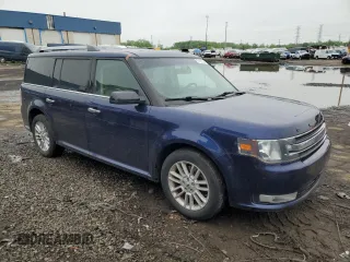 2016 Ford Flex SEL z VIN 2FMGK5C87GBA03716, wystawiony jako Copart lot #57429815 z przebiegiem 149 385 mil mil oraz Czysty tytuł • Clean title. Historia ofert i sprzedaży dostępna na DreamBid. Obrazek 4.