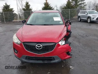 2014 Mazda CX-5 Touring with VIN JM3KE2CY2E0322211, listed as a IAAI auction lot 41721219 with 127,312 mi miles. Bid and sale history available at carsss.com. Image 12.
