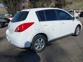 2009 Nissan Versa 1.8 SL with VIN 3N1BC13E19L389134, listed as a IAAI auction lot 41620431 with 190,884 mi miles. Bid and sale history available at carsss.com. Image 4.