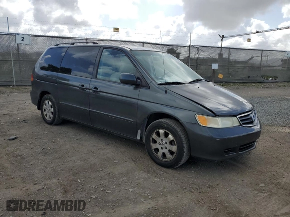2004 Honda Odyssey EX-L with VIN 5FNRL18944B052617, listed as a Copart auction lot 51443625 with 144,346 mi miles and Salvage Title. Bid and sale history available at DreamBid. Image 4.
