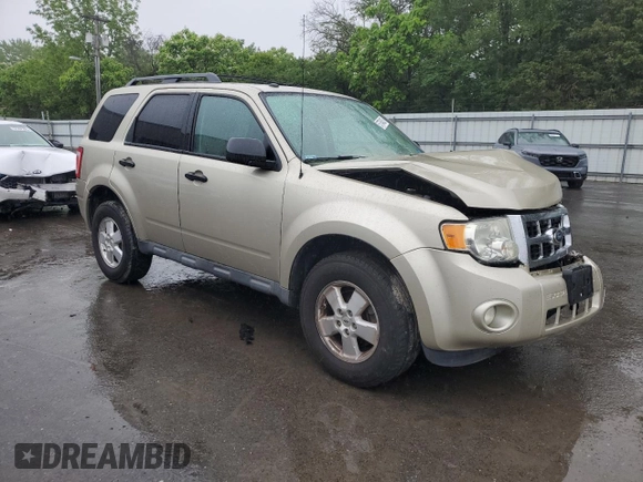 2012 Ford Escape XLT z VIN 1FMCU9DG1CKC74602, wystawiony jako Copart lot #57764325 z przebiegiem 153 872 mil mil oraz Szkoda całkowita • Salvage title. Historia ofert i sprzedaży dostępna na DreamBid. Obrazek 4.