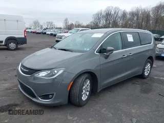 2020 Chrysler Pacifica Touring with VIN 2C4RC1FG3LR245765, listed as a IAAI auction lot 42069689 with 40,869 mi miles and . Bid and sale history available at DreamBid. Image 17.