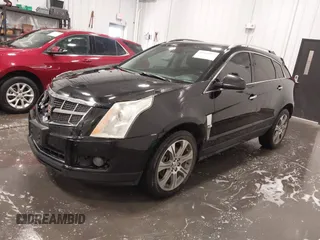 2012 Cadillac SRX Performance Collection z VIN 3GYFNBE30CS628660, wystawiony jako IAAI lot #42341993 z przebiegiem 249 922 mil mil oraz . Historia ofert i sprzedaży dostępna na DreamBid. Obrazek 2.