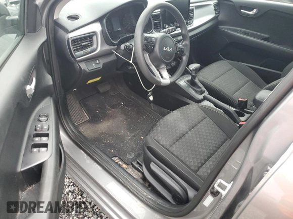 2023 Kia Rio S with VIN 3KPA24AD1PE531460, listed as a Copart auction lot 74285564 with 22,255 mi miles and Salvage Title. Bid and sale history available at DreamBid. Image 8.