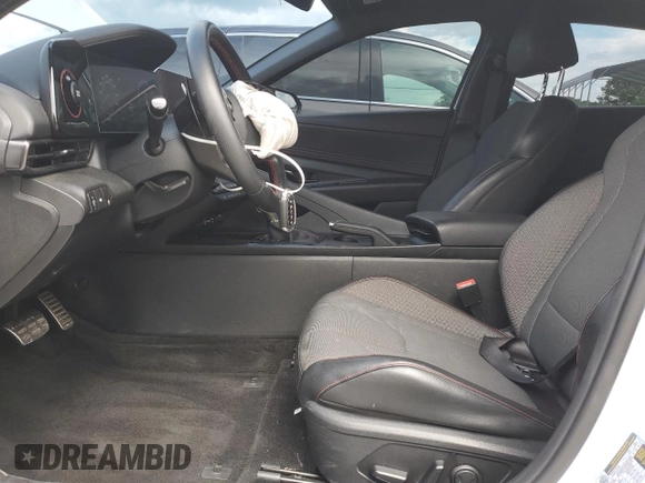 2023 Hyundai Elantra N Line z VIN KMHLR4AF1PU546303, wystawiony jako Copart lot #56982655 z przebiegiem 30 486 mil mil oraz Szkoda całkowita • Salvage title. Historia ofert i sprzedaży dostępna na DreamBid. Obrazek 7.