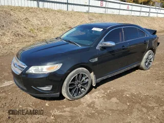 2011 Ford Taurus Limited z VIN 1FAHP2JW0BG140708, wystawiony jako Copart lot #52157335 z przebiegiem 141 229 mil mil oraz Czysty tytuł • Clean title. Historia ofert i sprzedaży dostępna na DreamBid. Obrazek 1.