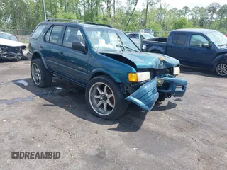 1999 Isuzu Rodeo S z VIN 4S2CK58W6X4332027, wystawiony jako IAAI lot #42087396 z przebiegiem 258 508 mil mil oraz . Historia ofert i sprzedaży dostępna na DreamBid. Obrazek 1.