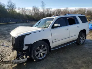 2017 GMC Yukon Denali with VIN 1GKS2CKJ3HR192875, listed as a Copart auction lot 50369075 with 112,877 mi miles and Salvage Title. Bid and sale history available at carsss.com. Image 1.