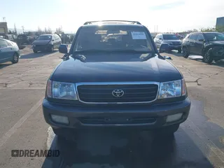 2000 Toyota Land Cruiser with VIN JT3HT05J3Y0098534, listed as a IAAI auction lot 41054858 with 336,520 mi miles. Bid and sale history available at carsss.com. Image 12.