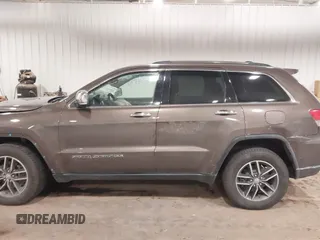 2018 Jeep Grand Cherokee Limited with VIN 1C4RJFBG2JC139502, listed as a IAAI auction lot 41372877 with 145,877 mi miles and . Bid and sale history available at DreamBid. Image 13.
