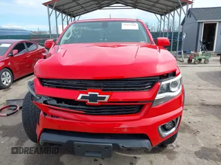 2018 Chevrolet Colorado 4WD Z71 z VIN 1GCGTDEN8J1141945, wystawiony jako IAAI lot #41837680 z przebiegiem 67 686 mil mil oraz . Historia ofert i sprzedaży dostępna na DreamBid. Obrazek 12.