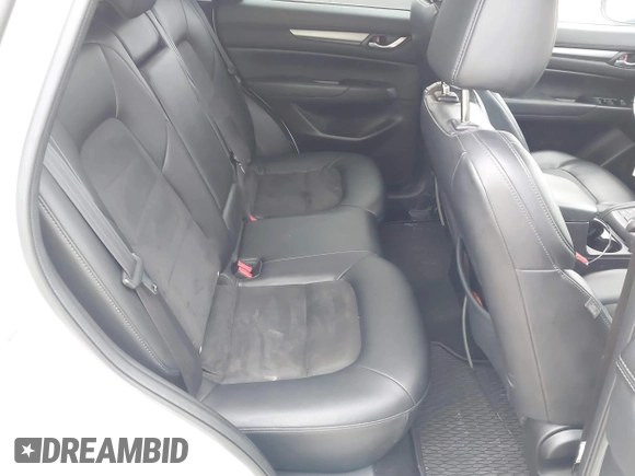 2018 Mazda CX-5 Touring z VIN JM3KFBCM6J0323107, wystawiony jako IAAI lot #41895519 z przebiegiem 86 124 mil mil oraz . Historia ofert i sprzedaży dostępna na DreamBid. Obrazek 8.