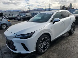 2023 Lexus RX with VIN JTJCHMAA2P2003045, listed as a Copart auction lot 42459165 with 27,236 mi miles and Salvage Title. Bid and sale history available at carsss.com. Image 1.