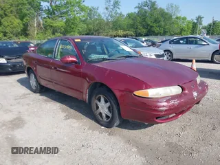 2002 Oldsmobile Alero GL1 z VIN 1G3NL52E02C215561, wystawiony jako IAAI lot #42230290 z przebiegiem 177 176 mil mil oraz . Historia ofert i sprzedaży dostępna na DreamBid. Obrazek 1.