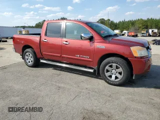 2014 Nissan Titan SV with VIN 1N6BA0ED0EN511331, listed as a Copart auction lot 48921865 with 119,373 mi miles and Salvage title. Bid and sale history available at DreamBid. Image 4.