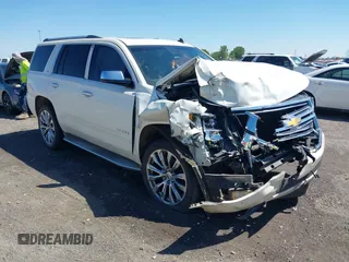 2015 Chevrolet Tahoe LTZ z VIN 1GNSKCKC6FR166420, wystawiony jako IAAI lot #42020861 z przebiegiem 248 761 mil mil oraz . Historia ofert i sprzedaży dostępna na DreamBid. Obrazek 1.