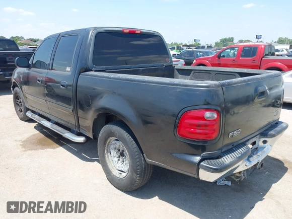 2002 Ford F-150 XLT with VIN 1FTRW07602KD37873, listed as a IAAI auction lot 42048067 with 1 mi miles. Bid and sale history available at carsss.com. Image 3.
