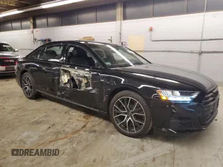 2021 Audi A8 with VIN WAU8EAF87MN026527, listed as a Copart auction lot 77295413 with 7,276 mi miles. Bid and sale history available at carsss.com. Image 4.