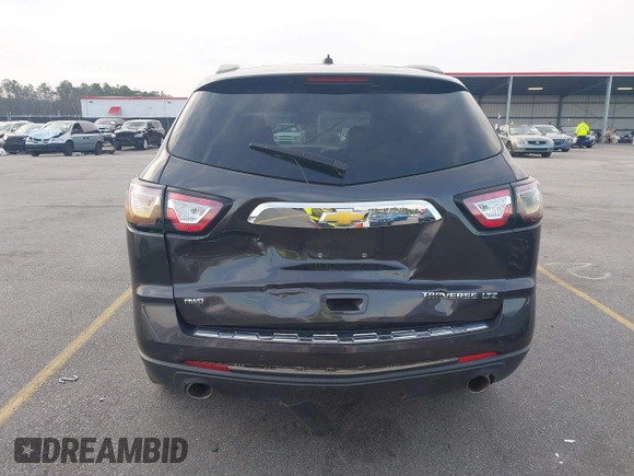 2015 Chevrolet Traverse LTZ with VIN 1GNKVJKDXFJ206159, listed as a IAAI auction lot 41762515 with 143,062 mi miles and . Bid and sale history available at DreamBid. Image 16.