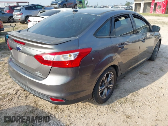 2014 Ford Focus SE with VIN 1FADP3F24EL320991, listed as a IAAI auction lot 41932638 with 133,163 mi miles. Bid and sale history available at carsss.com. Image 4.