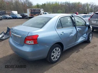 2009 Toyota Yaris with VIN JTDBT903891336792, listed as a IAAI auction lot 42096543 with 115,735 mi miles and . Bid and sale history available at DreamBid. Image 4.