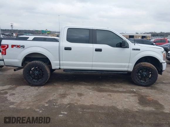 2018 Ford F-150 XL with VIN 1FTEW1EP4JFD42727, listed as a IAAI auction lot 41209698 with 131,234 mi miles. Bid and sale history available at carsss.com. Image 13.