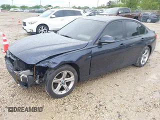 2013 BMW 3 Series 328i xDrive with VIN WBA3B3C50DJ698249, listed as a IAAI auction lot 42303923 with 130,527 mi miles and . Bid and sale history available at DreamBid. Image 2.
