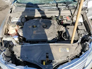 2014 Lincoln MKZ с VIN 3LN6L2G91ER836193, выставлен на аукционе Copart как лот 57689765 с пробегом 146 385 миль миль и На запчасти • Non repairable. История ставок и продаж доступна на DreamBid. Изображение 11.