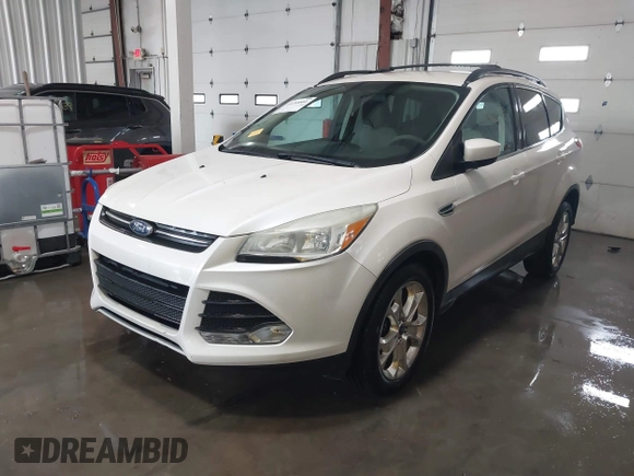 2013 Ford Escape SE с VIN 1FMCU0GX9DUD77960, выставлен на аукционе IAAI как лот 41498045 с пробегом 152 730 миль миль и . История ставок и продаж доступна на DreamBid. Изображение 2.