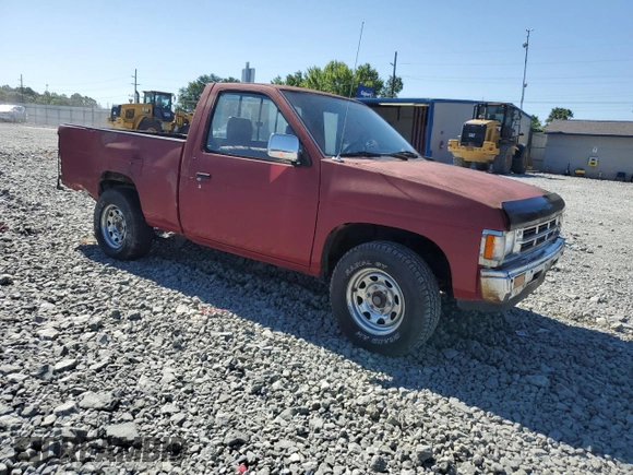 1991 Nissan Frontier XE with VIN 1N6SD11S2MC412375, listed as a Copart auction lot 61015515 with 201,629 mi miles and Salvage title. Bid and sale history available at DreamBid. Image 4.