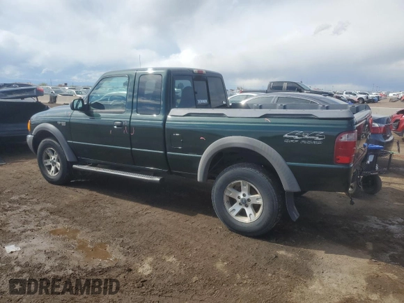 2002 Ford Ranger XL Fleet with VIN 1FTZR45E82PB05436, listed as a Copart auction lot 54821815 with 256,090 mi miles and Salvage title. Bid and sale history available at DreamBid. Image 2.