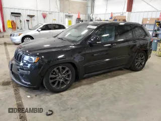 2019 Jeep Grand Cherokee Overland with VIN 1C4RJFCT8KC610341, listed as a Copart auction lot 83424454 with 57,356 mi miles and Salvage Title. Bid and sale history available at carsss.com. Image 1.