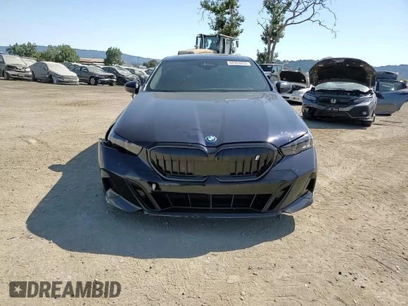 2024 BMW i5 eDrive40 with VIN WBY33FK03RCS14771, listed as a Copart auction lot 62393255 with 25,192 mi miles and Salvage title. Bid and sale history available at DreamBid. Image 13.