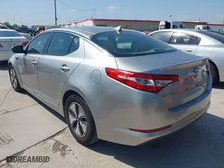 2013 Kia Optima Hybrid EX with VIN KNAGM4AD8D5059623, listed as a IAAI auction lot 42052998 with 135,051 mi miles. Bid and sale history available at carsss.com. Image 3.