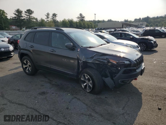 2015 Jeep Cherokee Trailhawk z VIN 1C4PJMBS2FW705132, wystawiony jako Copart lot #59884325 z przebiegiem 100 438 mil mil oraz Szkoda całkowita • Salvage title. Historia ofert i sprzedaży dostępna na DreamBid. Obrazek 4.