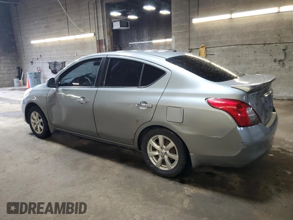 2014 Nissan Versa S Plus with VIN 3N1CN7AP6EL828134, listed as a Copart auction lot 53902045 with 142,825 mi miles and Salvage Title. Bid and sale history available at DreamBid. Image 2.
