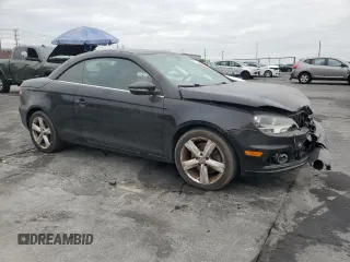 2012 Volkswagen Eos Lux with VIN WVWFW7AH6CV005880, listed as a Copart auction lot 82214934 with 149,477 mi miles and Salvage Title. Bid and sale history available at DreamBid. Image 4.