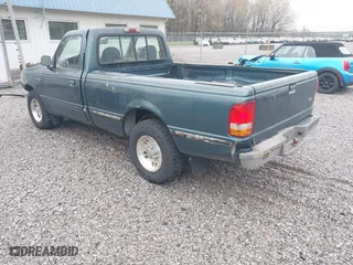 1995 Ford Ranger XLT with VIN 1FTCR10X9STA67218, listed as a IAAI auction lot 41952953 with 230,733 mi miles. Bid and sale history available at carsss.com. Image 3.