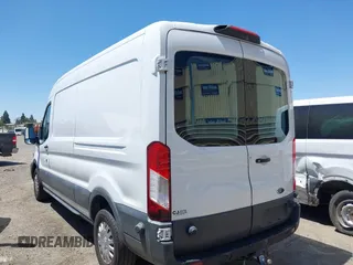 2018 Ford Transit with VIN 1FTYR2CM9JKA52056, listed as a IAAI auction lot 42542981 with 151,835 mi miles and . Bid and sale history available at DreamBid. Image 3.
