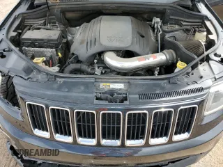 2014 Jeep Grand Cherokee Limited z VIN 1C4RJFBT6EC184557, wystawiony jako Copart lot #57657095 z przebiegiem 157 688 mil mil oraz Szkoda całkowita • Salvage title. Historia ofert i sprzedaży dostępna na DreamBid. Obrazek 12.
