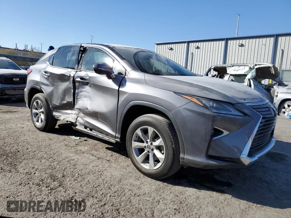2019 Lexus RX with VIN 2T2ZZMCAXKC138738, listed as a Copart auction lot 42604515 with 60,604 mi miles and Salvage Title. Bid and sale history available at carsss.com. Image 4.