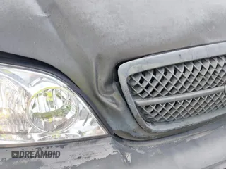 2004 Kia Sedona LX with VIN KNDUP131346533373, listed as a IAAI auction lot 41632342 with 76,545 mi miles. Bid and sale history available at carsss.com. Image 12.