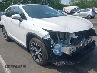 2020 Lexus RX 450h with VIN 2T2HGMDAXLC052802, listed as a IAAI auction lot 42422920 with 63,609 mi miles and . Bid and sale history available at DreamBid. Image 1.