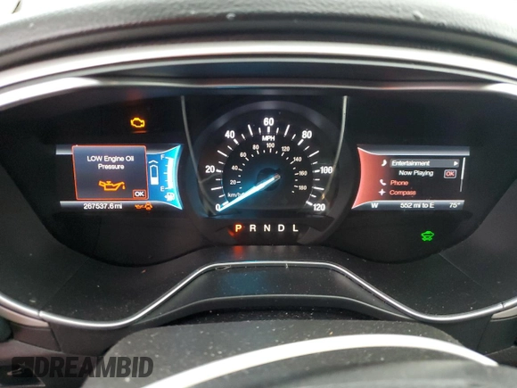 2016 Ford Fusion SE Hybrid z VIN 3FA6P0LUXGR350997, wystawiony jako Copart lot #62301825 z przebiegiem 267 537 mil mil oraz Szkoda całkowita • Salvage title. Historia ofert i sprzedaży dostępna na DreamBid. Obrazek 9.