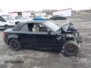 2011 BMW 1 Series 128i with VIN WBAUN1C5XBVH82457, listed as a IAAI auction lot 41173785 with Not provided miles and . Bid and sale history available at DreamBid. Image 13.